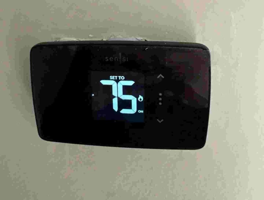 Smart thermostat in use inside a Baltimore home